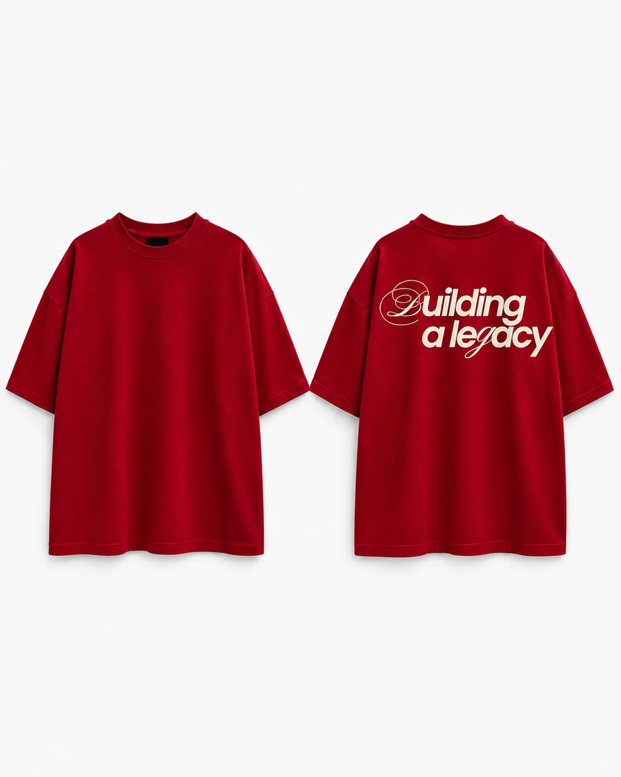 Red oversized tee, front and back. Back reads Building a legacy in cream script and sans type