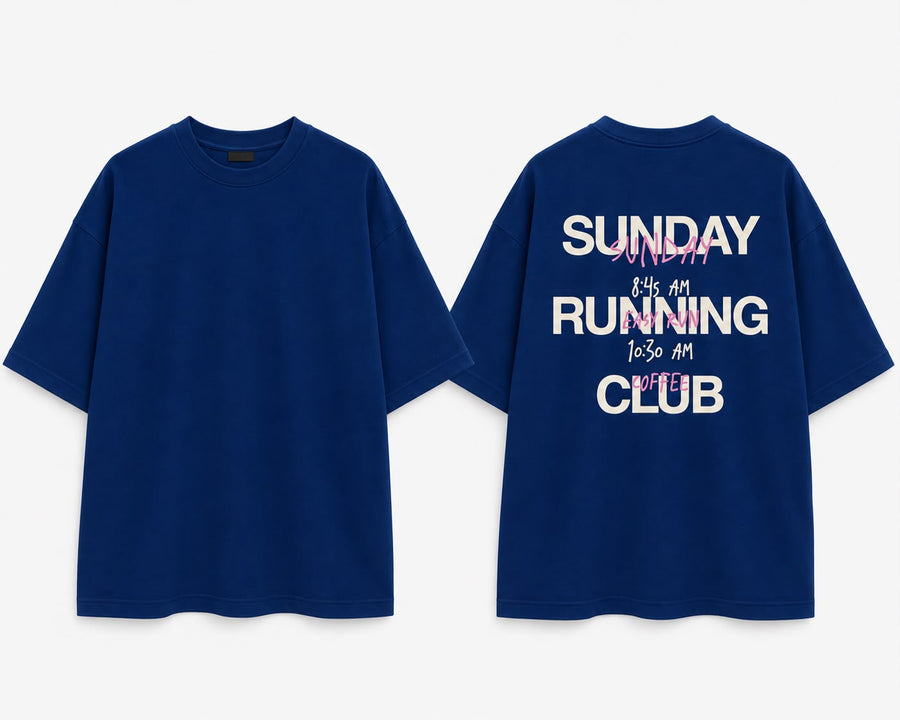 Navy oversized tee, front and back. Back reads SUNDAY RUNNING CLUB with 8:45 AM easy run and 10:30 AM coffee in pink